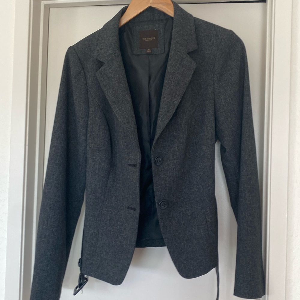 The limited jacket size medium charcoal gray